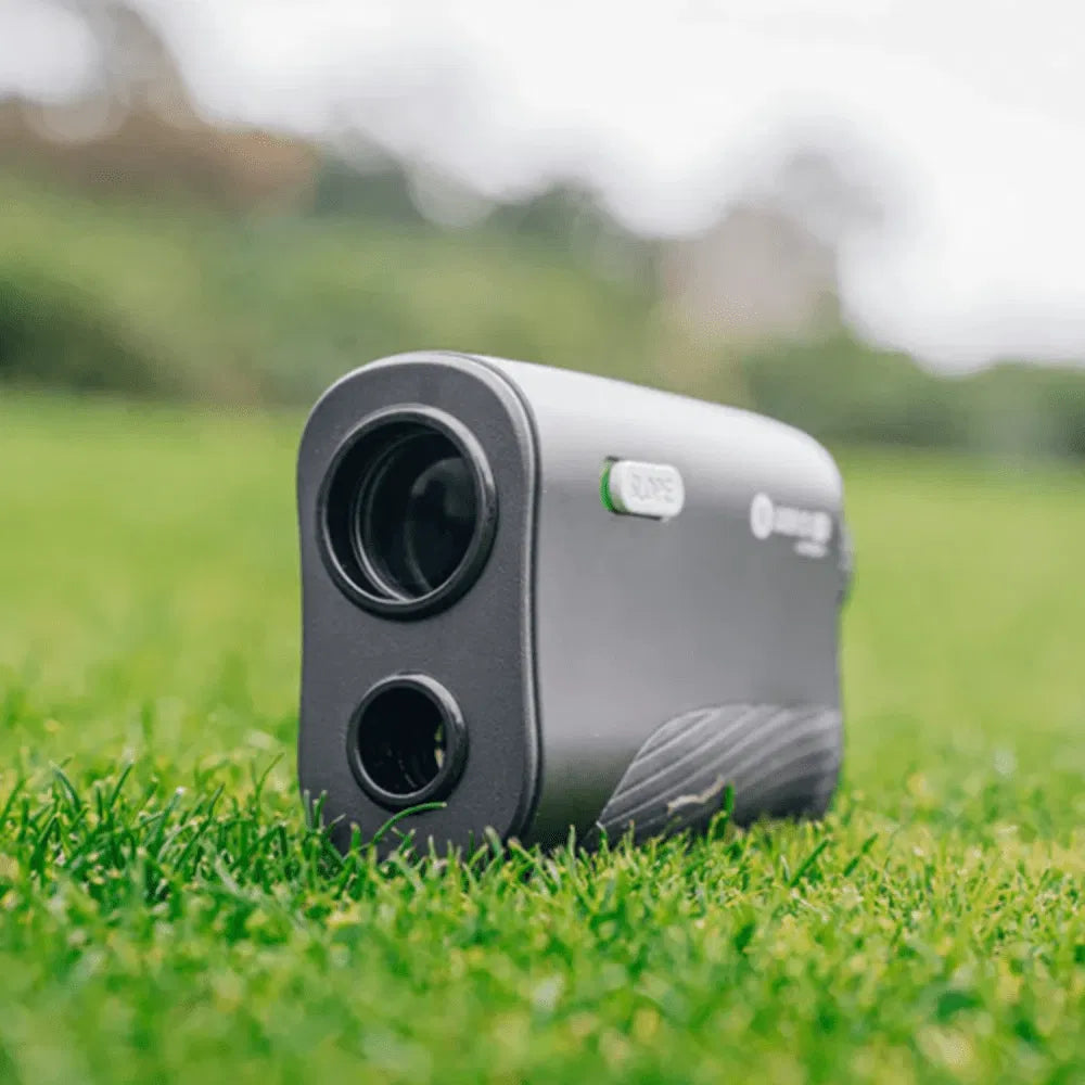 Rangefinder on grass with a blurred background