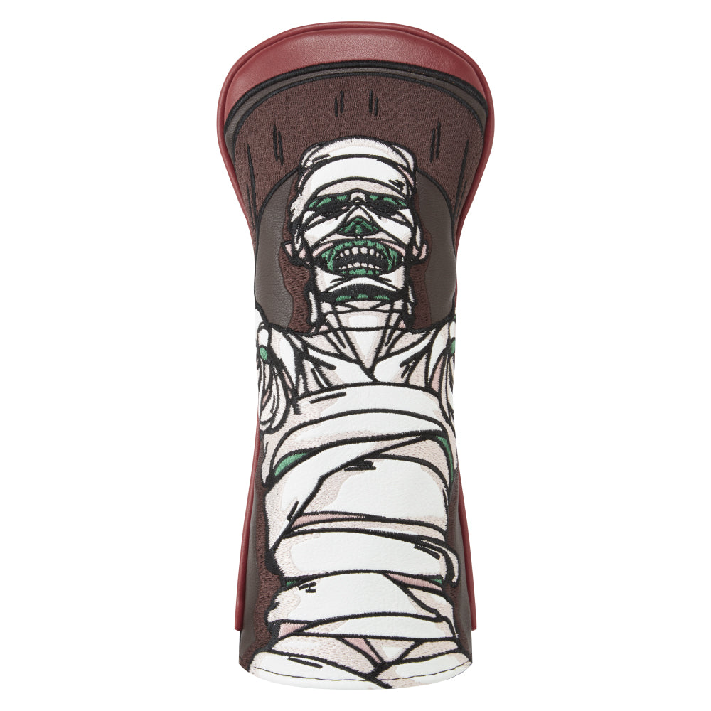 Unique Mummy design hybrid golf head cover, mummy set against Burgundy and deep brown backdrop with hints of green for a ghostly affect and detailed bandaging. Design embroidered onto faux leather material.